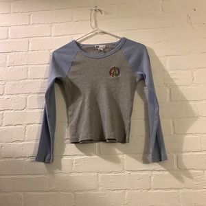 we are selling a peace sign long sleeve from RSQ